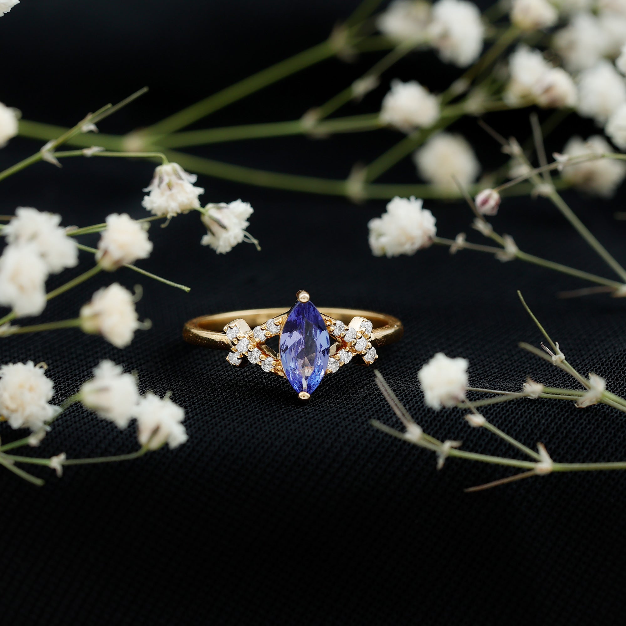 Marquise Tanzanite Ring – Elegant Blue Gemstone With Diamond Promise Band