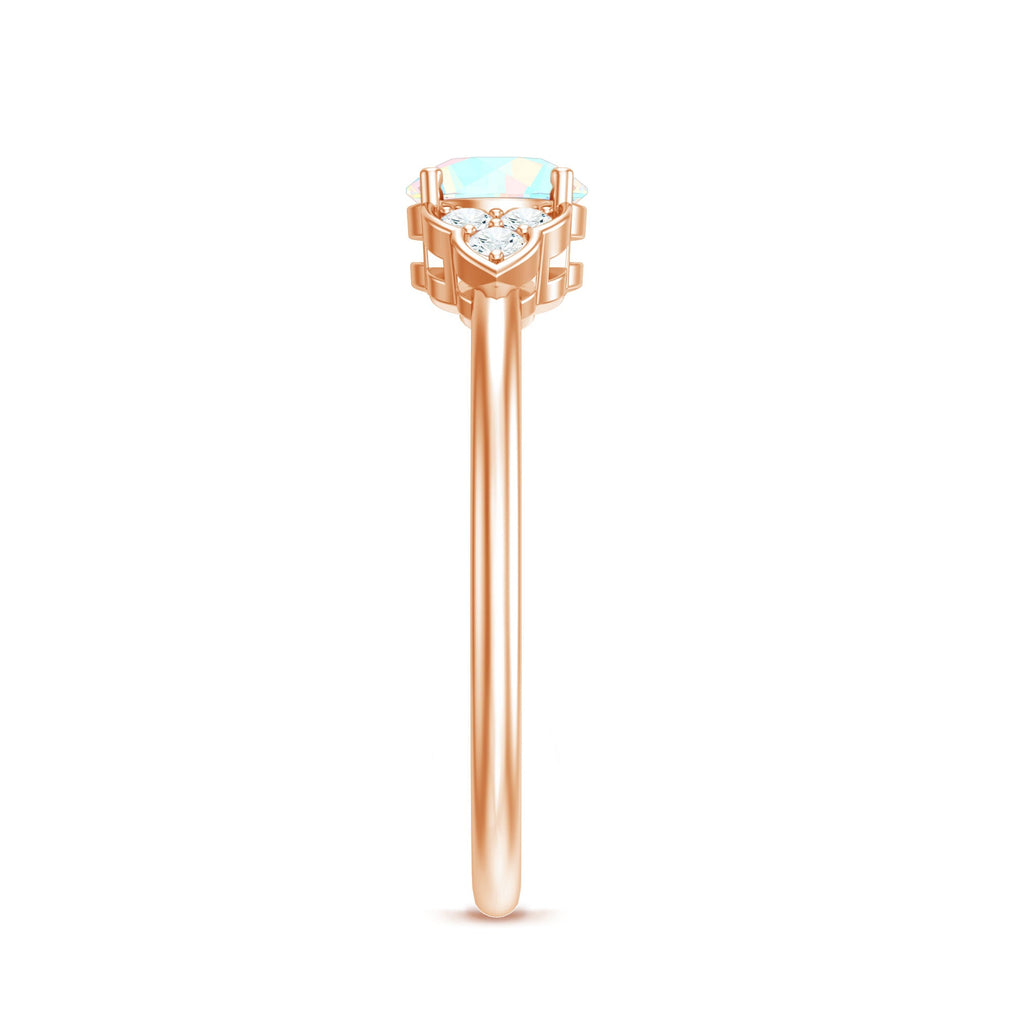 Natural Ethiopian Rainbow Opal Engagement Ring with Diamond Trio