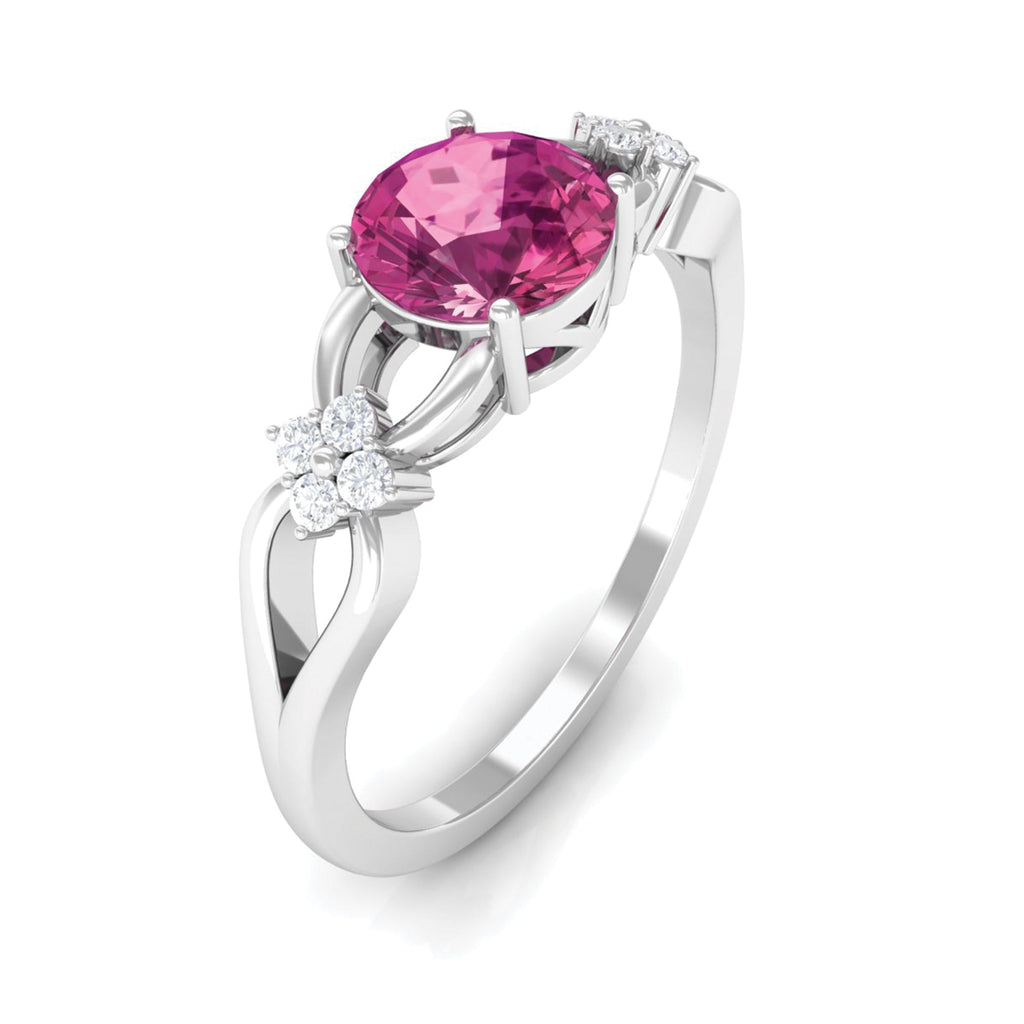 Pink tourmaline solitaire floral ring with diamond accents on a silver band