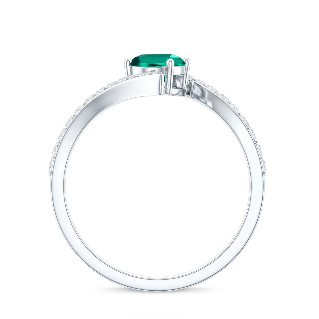 Oval Shaped 5X7 MM Lab Grown Emerald Bypass Engagement Ring