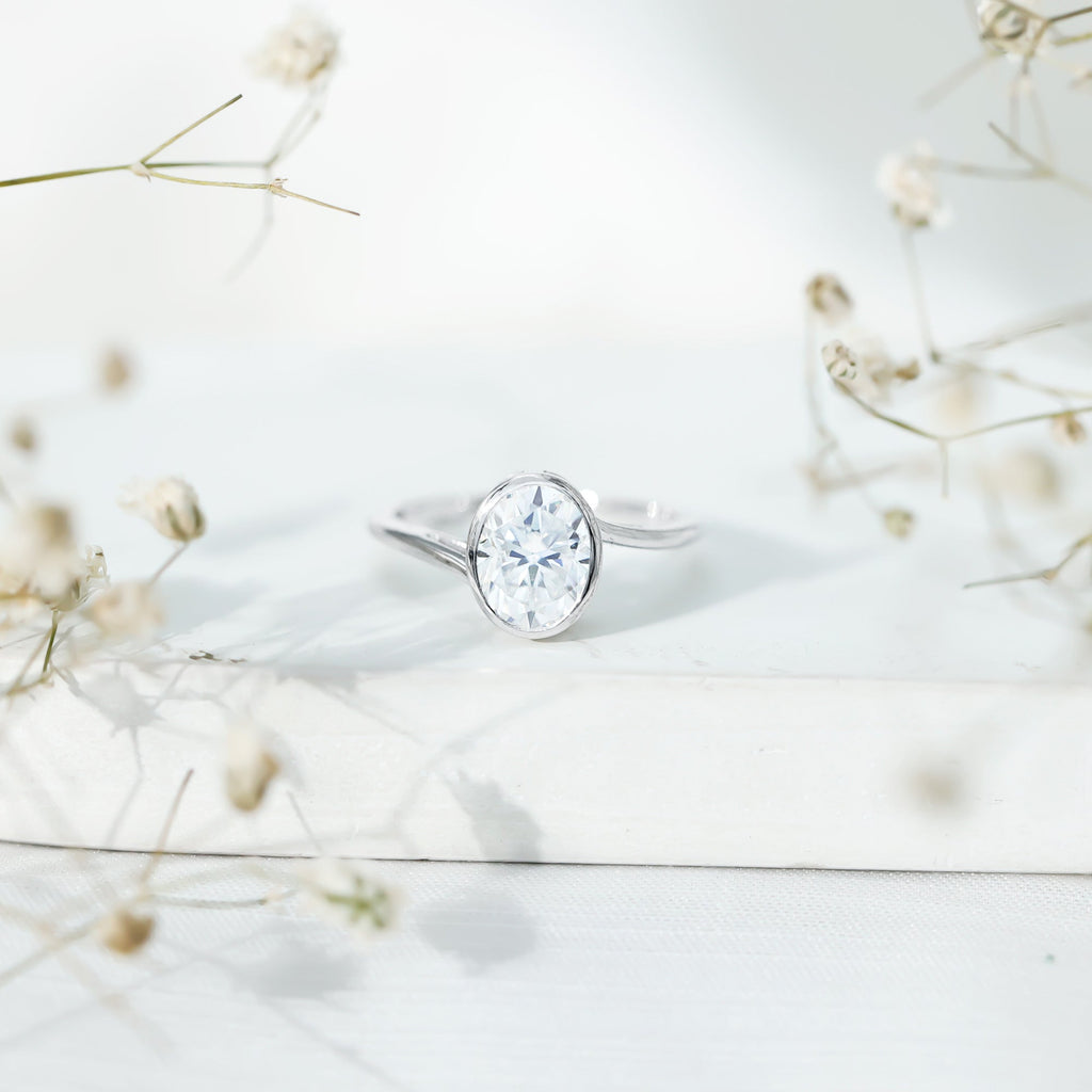 2 Carat Moissanite Ring - Oval Cut Bezel Set Solitaire with Bypass Shank