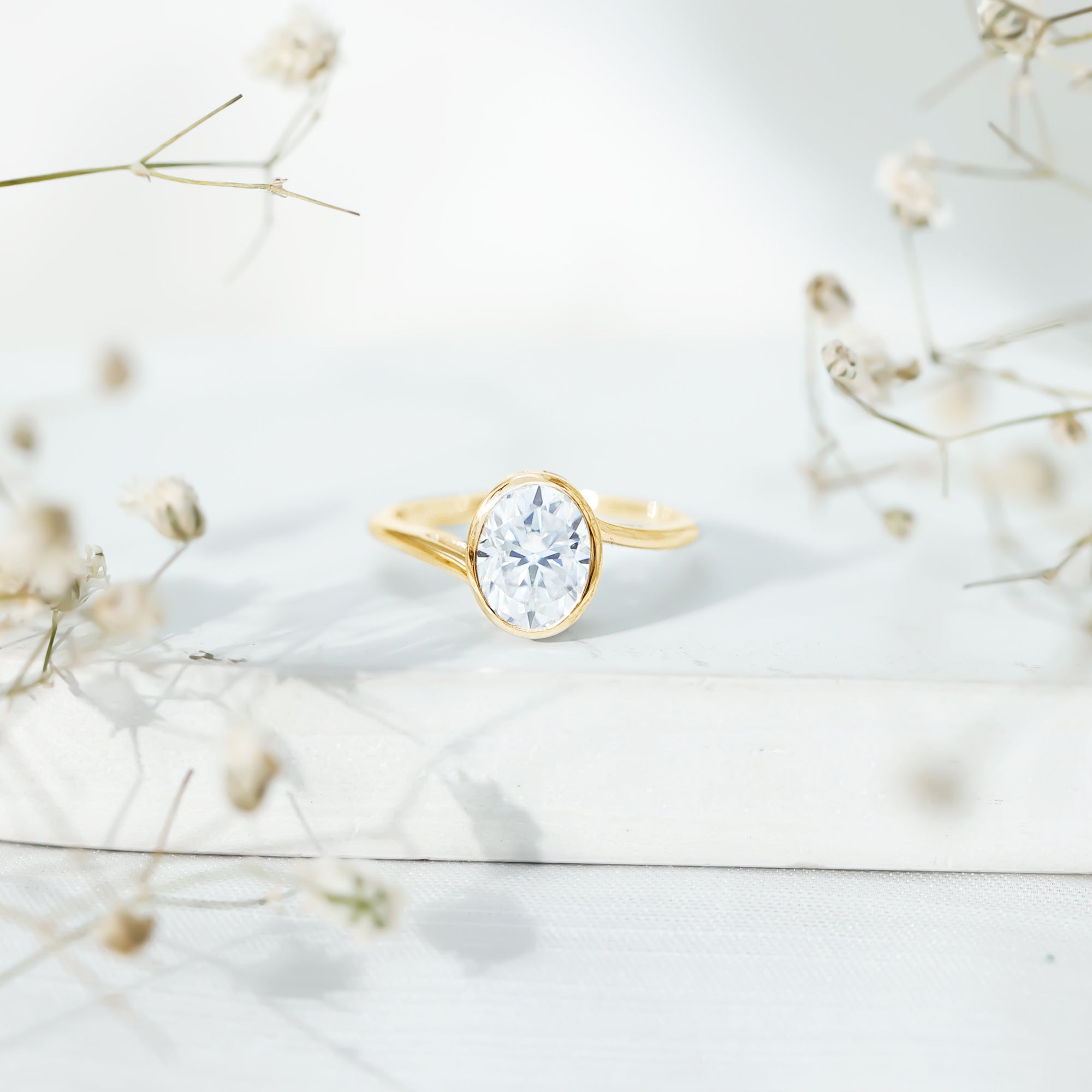 2 Carat Moissanite Ring - Oval Cut Bezel Set Solitaire with Bypass Shank