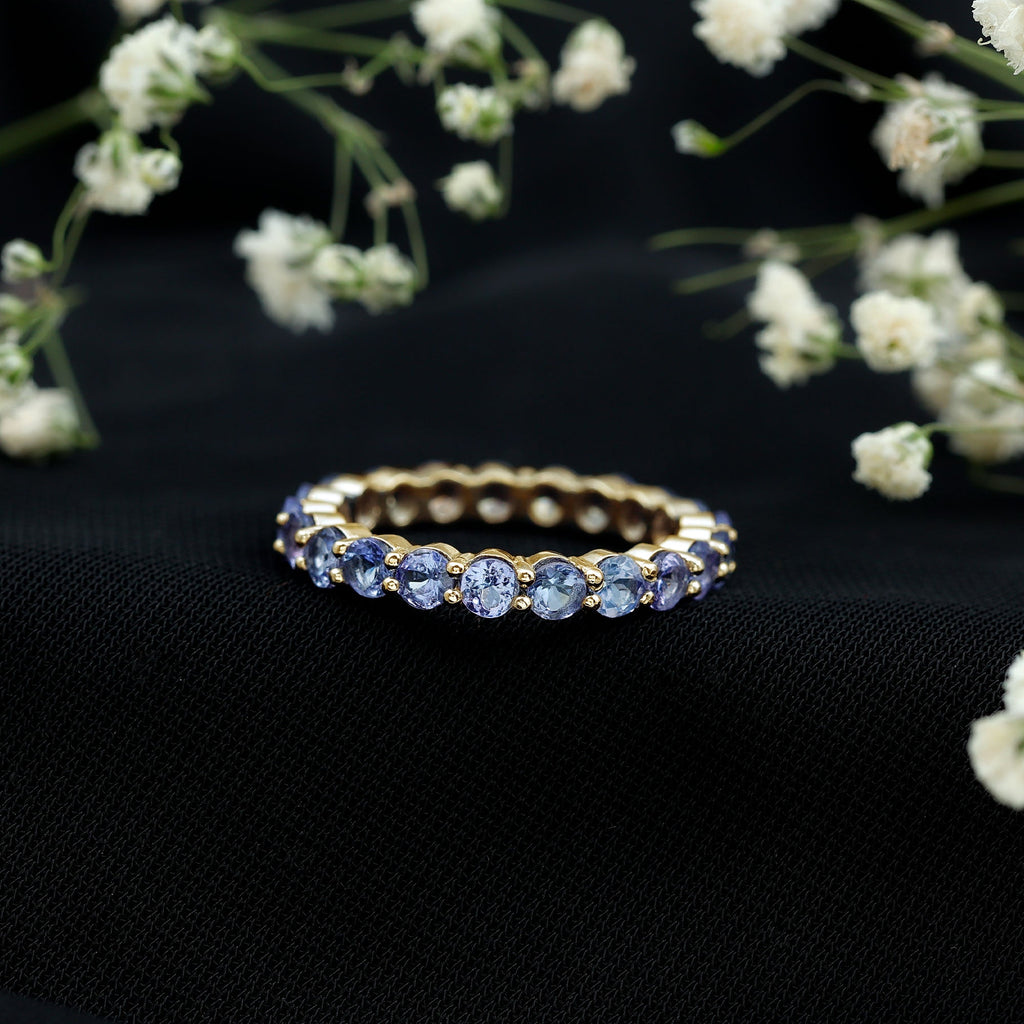 Tanzanite Eternity Ring – Full Eternity Band with Blue Violet Gemstones in Shared Prong Setting