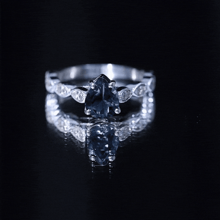 1 Carat Pear Shaped London Blue Topaz Teardrop Engagement Ring with Diamond