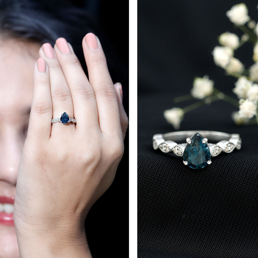 1 Carat Pear Shaped London Blue Topaz Teardrop Engagement Ring with Diamond