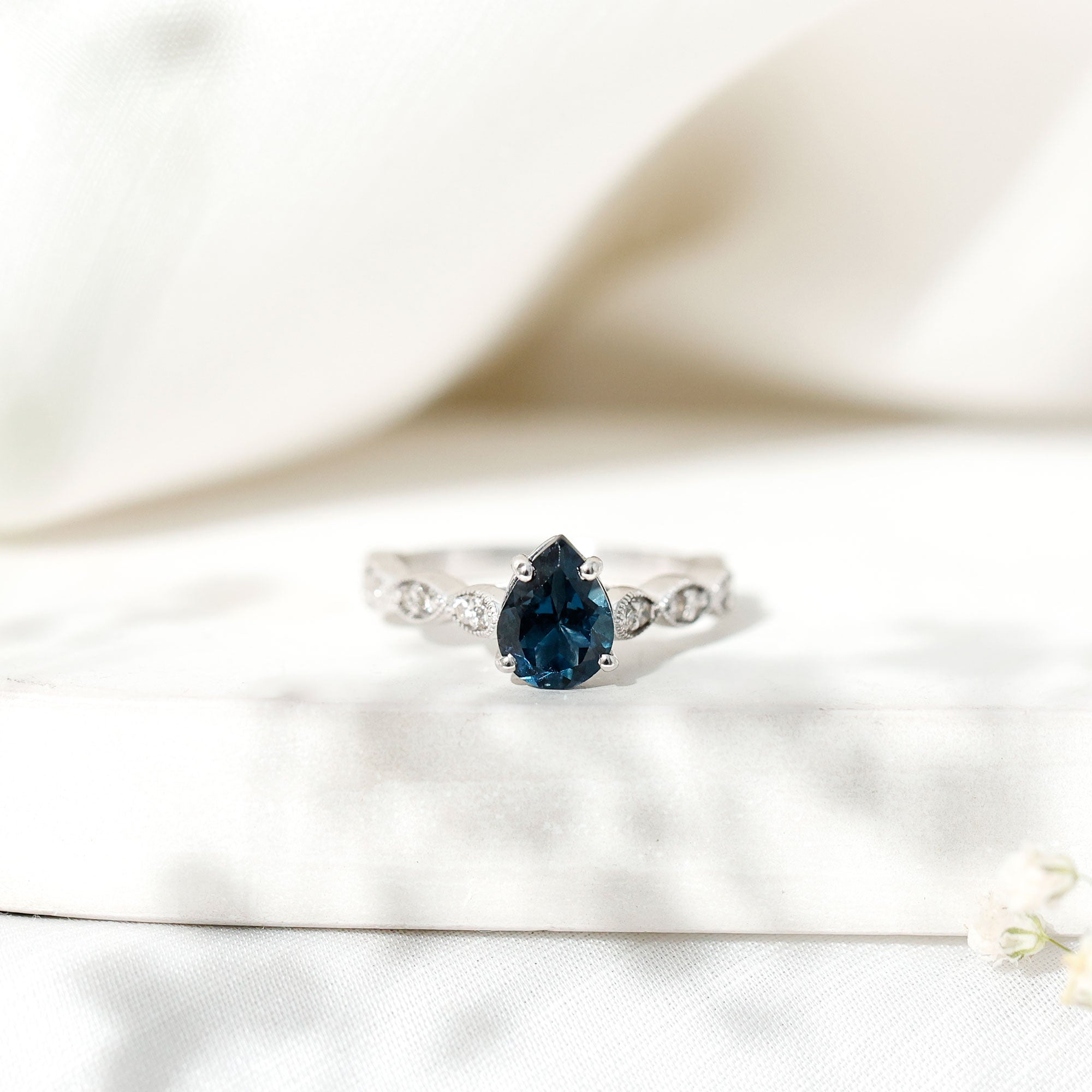 1 Carat Pear Shaped London Blue Topaz Teardrop Engagement Ring with Diamond