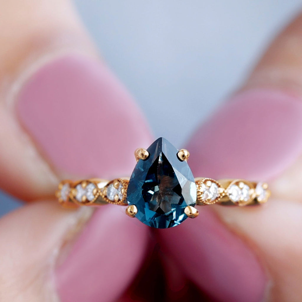 1 Carat Pear Shaped London Blue Topaz Teardrop Engagement Ring with Diamond