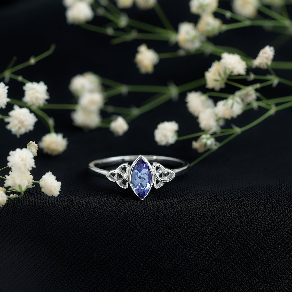 Marquise Tanzanite Ring – Bezel Set Promise Ring with Celtic Knot Design