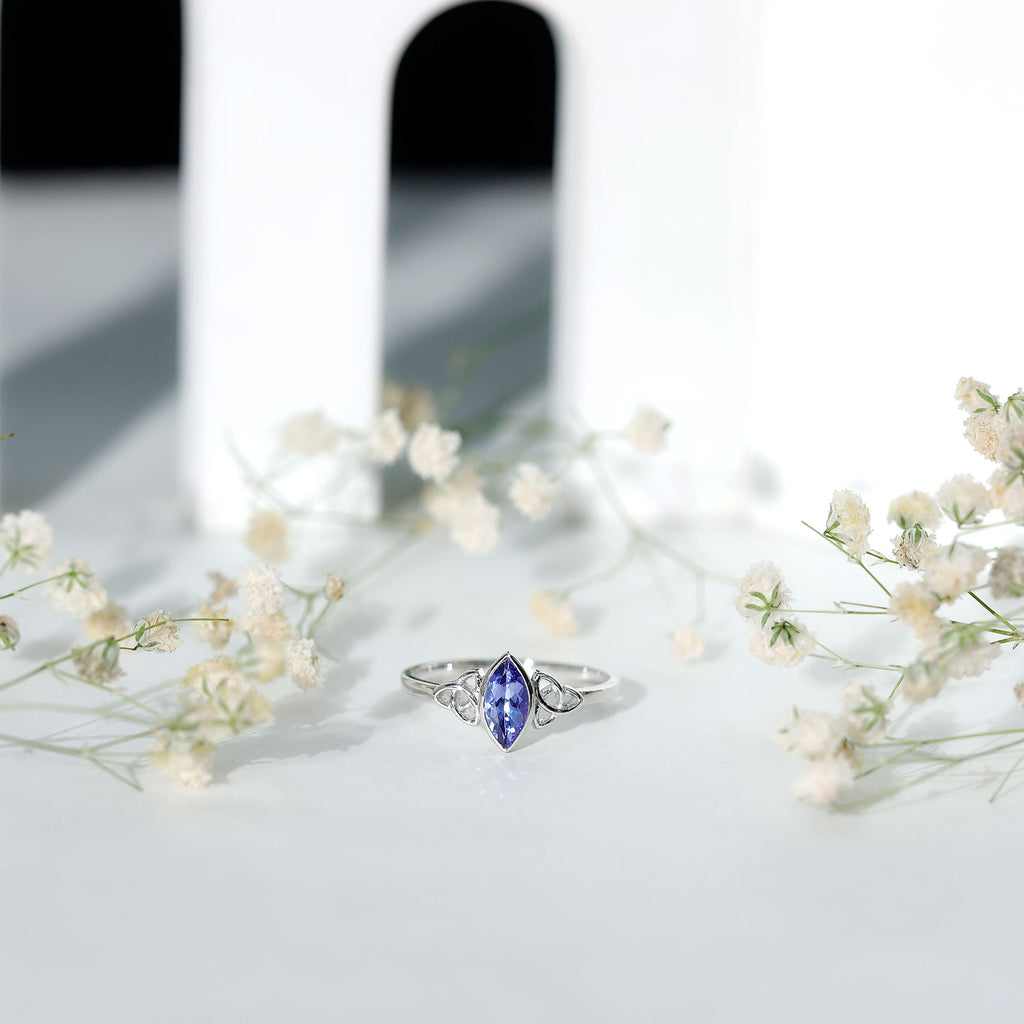 Marquise Tanzanite Ring – Bezel Set Promise Ring with Celtic Knot Design