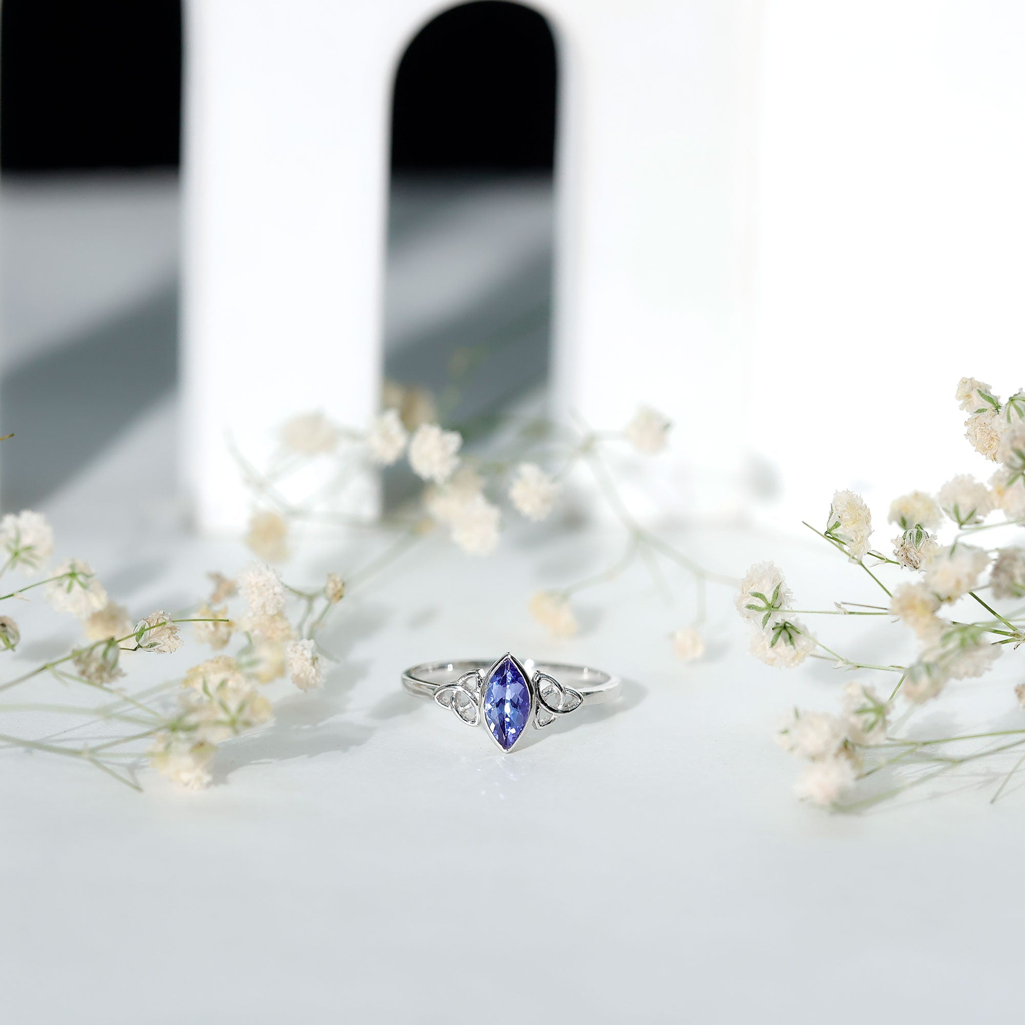 Marquise Tanzanite Ring – Bezel Set Promise Ring with Celtic Knot Design