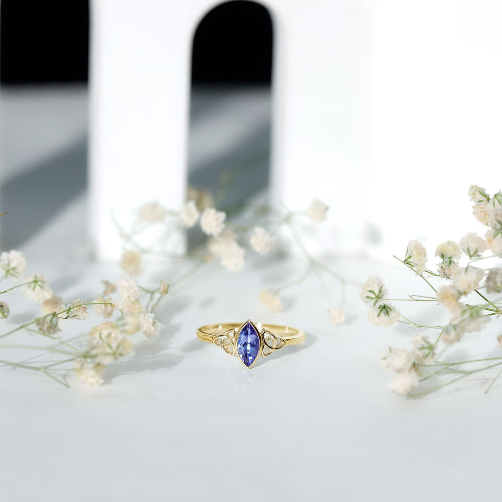 Marquise Tanzanite Ring – Bezel Set Promise Ring with Celtic Knot Design