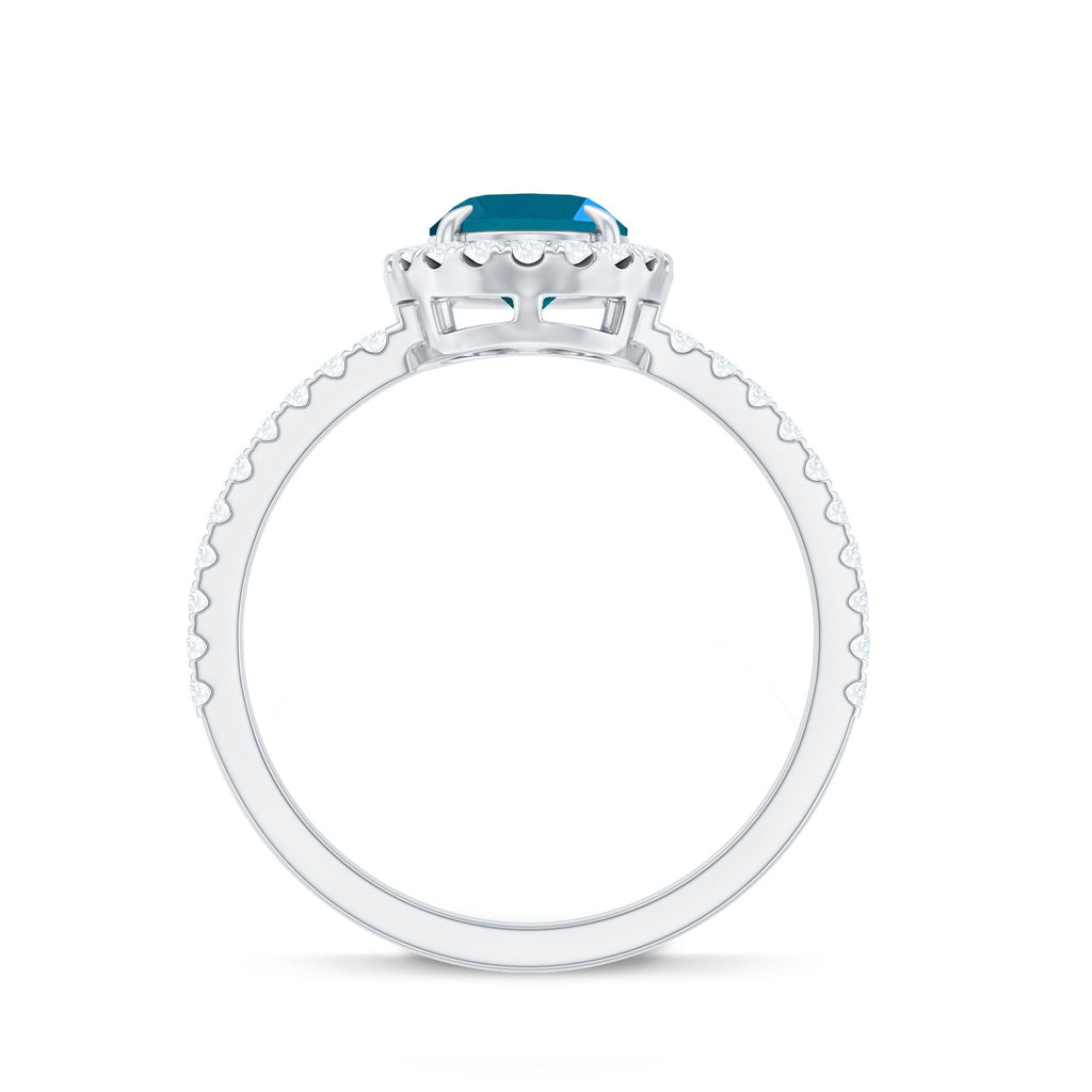 Oval 1 Carat London Blue Topaz Halo Engagement Ring