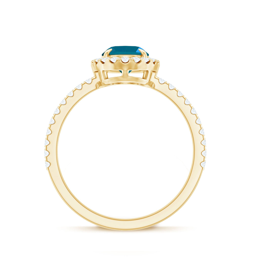 Oval 1 Carat London Blue Topaz Halo Engagement Ring
