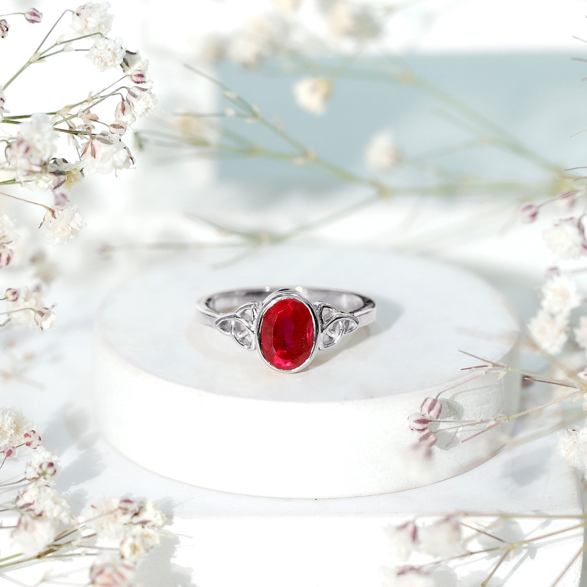 Lab Grown Ruby Ring – 1.5 Carat Oval Solitaire Bezel Setting Celtic Engagement Band