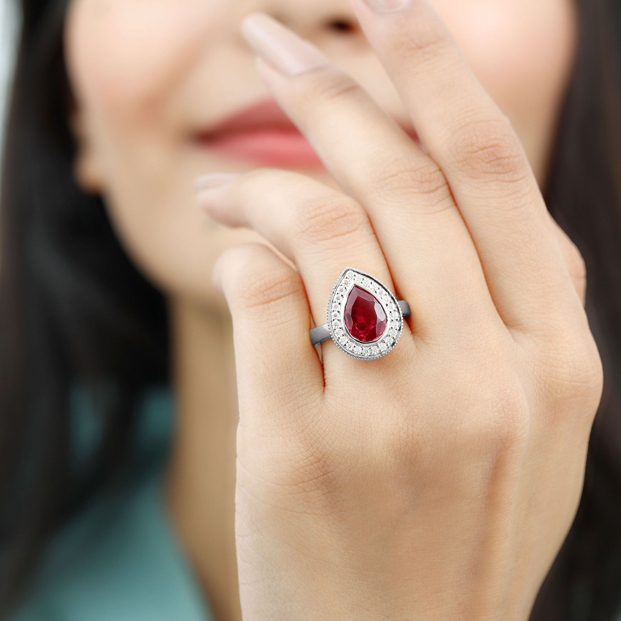 Lab Created Ruby Ring – 2.9 Ct Pear Shaped Ruby with Diamond Halo Design