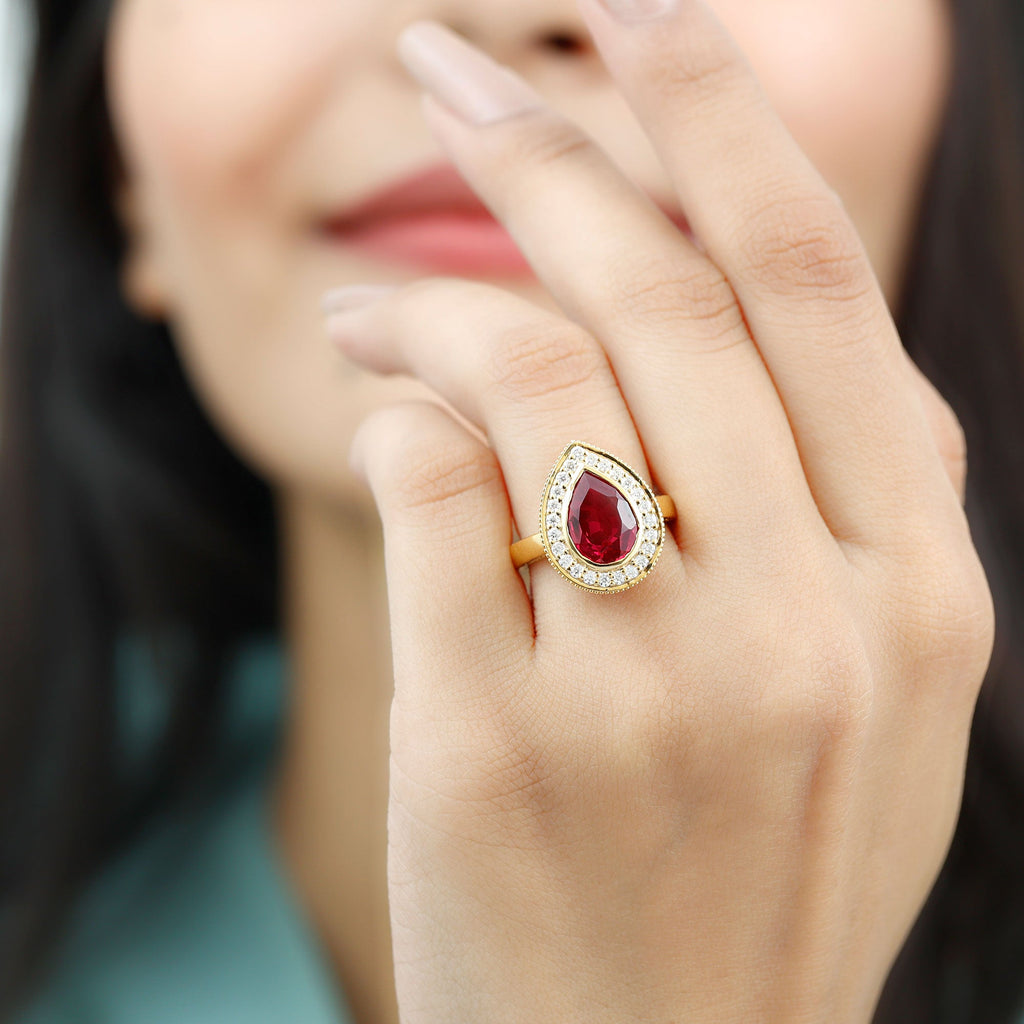 Lab Created Ruby Ring – 2.9 Ct Pear Shaped Ruby with Diamond Halo Design