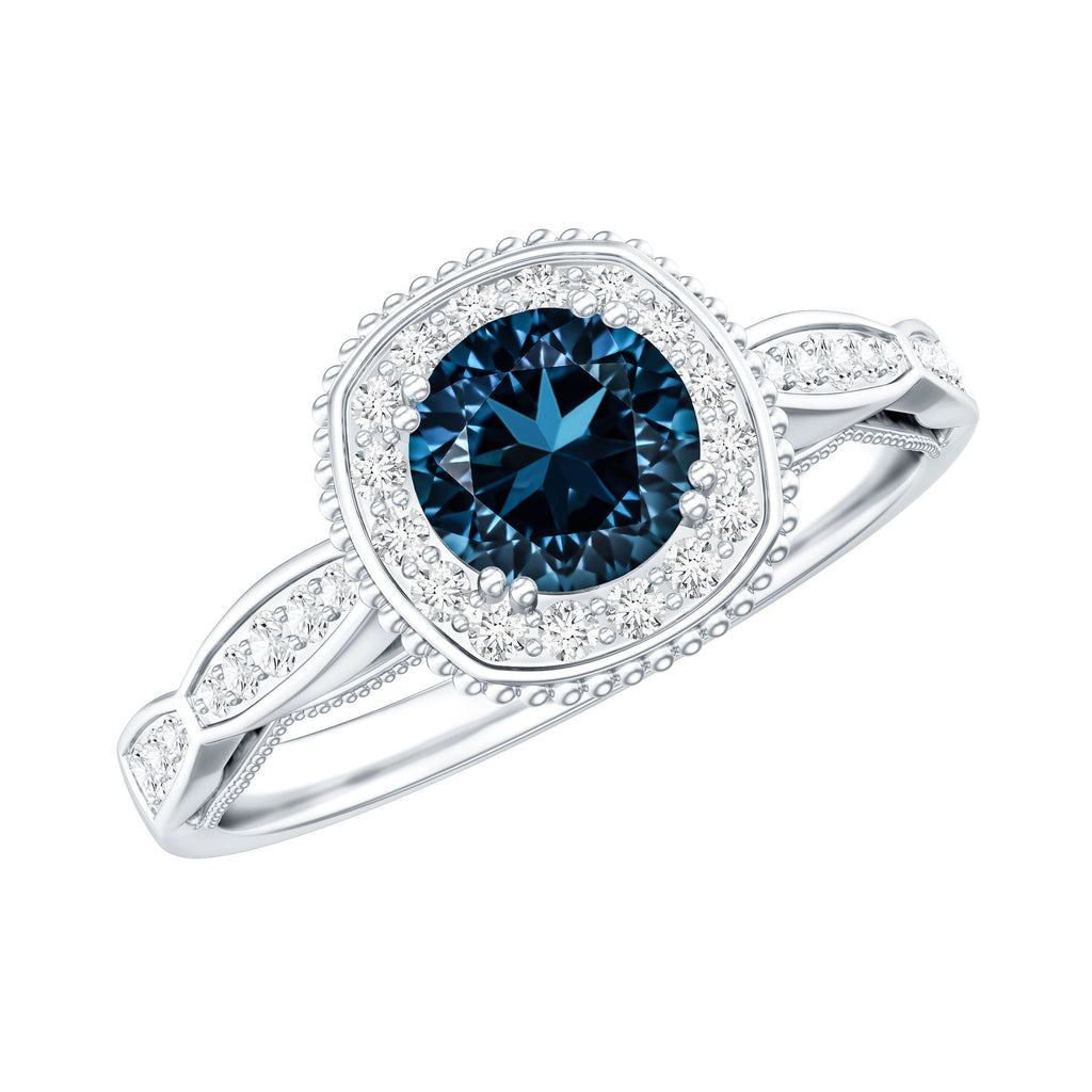 0.6 Carat London Blue topaz Vintage Inspired Ring with Diamond Halo