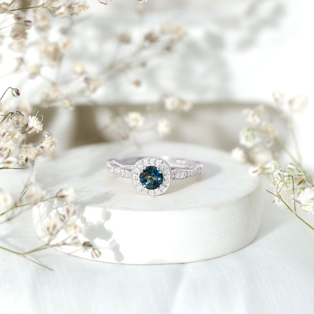 0.6 Carat London Blue topaz Vintage Inspired Ring with Diamond Halo
