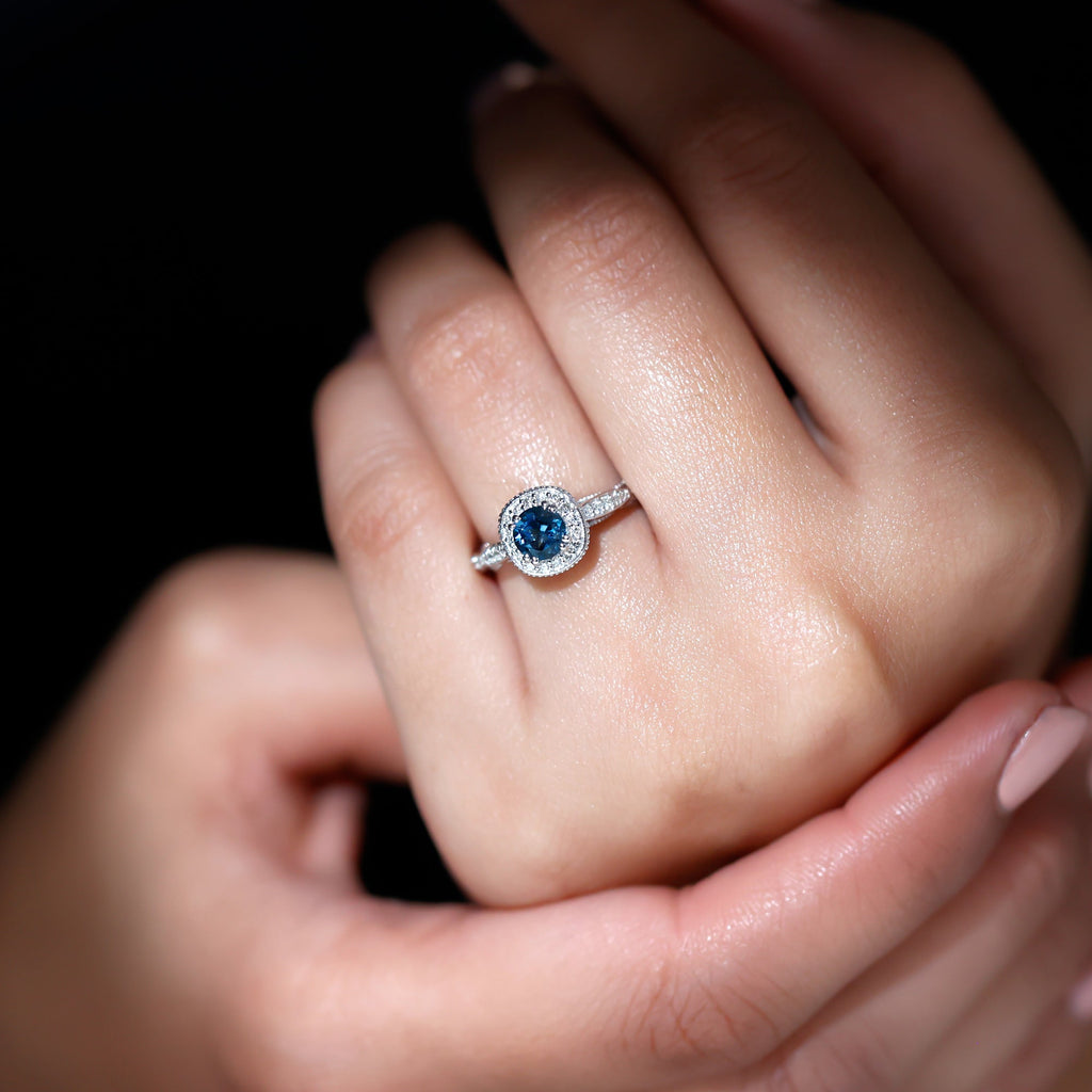 0.6 Carat London Blue topaz Vintage Inspired Ring with Diamond Halo