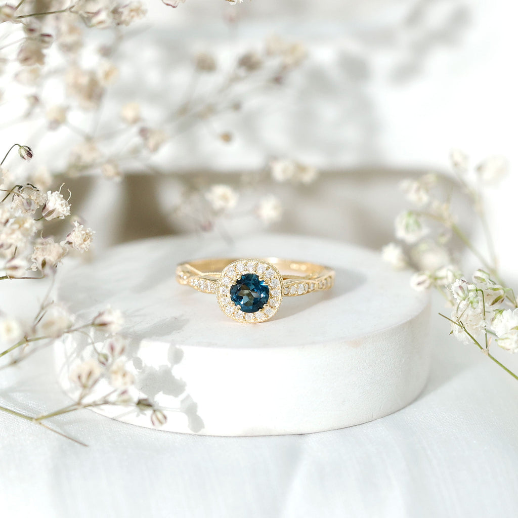 0.6 Carat London Blue topaz Vintage Inspired Ring with Diamond Halo