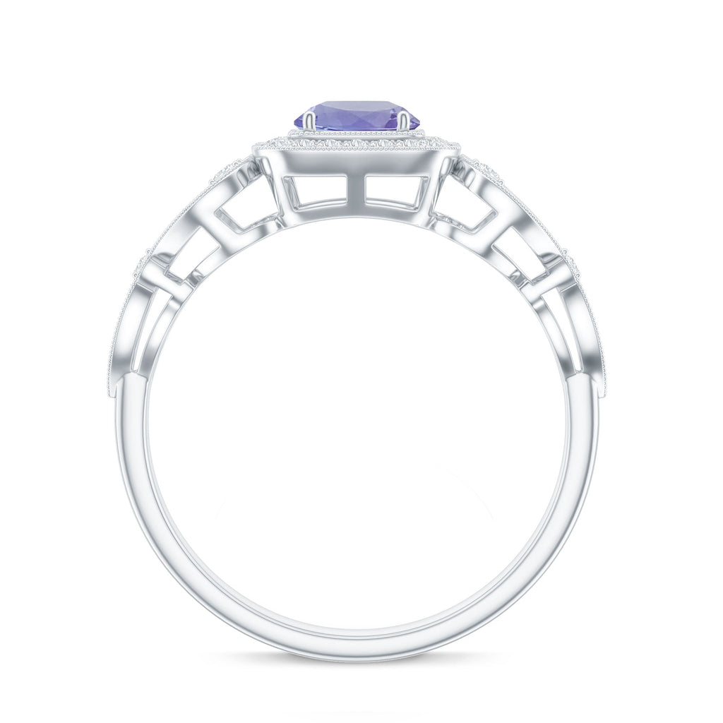 Vintage Tanzanite Ring – Prong Set 5mm Blue Gemstone with Diamond Halo Band