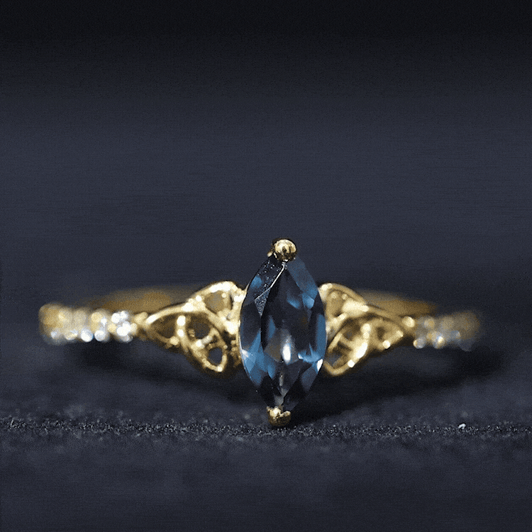 0.74 Carat Marquise Cut London Blue Topaz Celtic Engagement Ring with Diamond