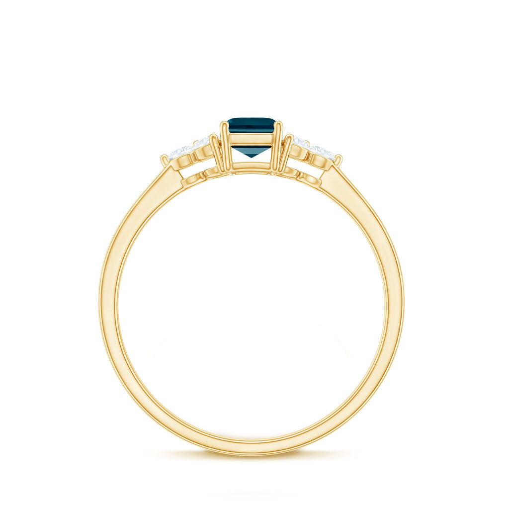 London Blue Topaz Ring – Emerald Cut Engagement with Diamond Trio in Prong Setting