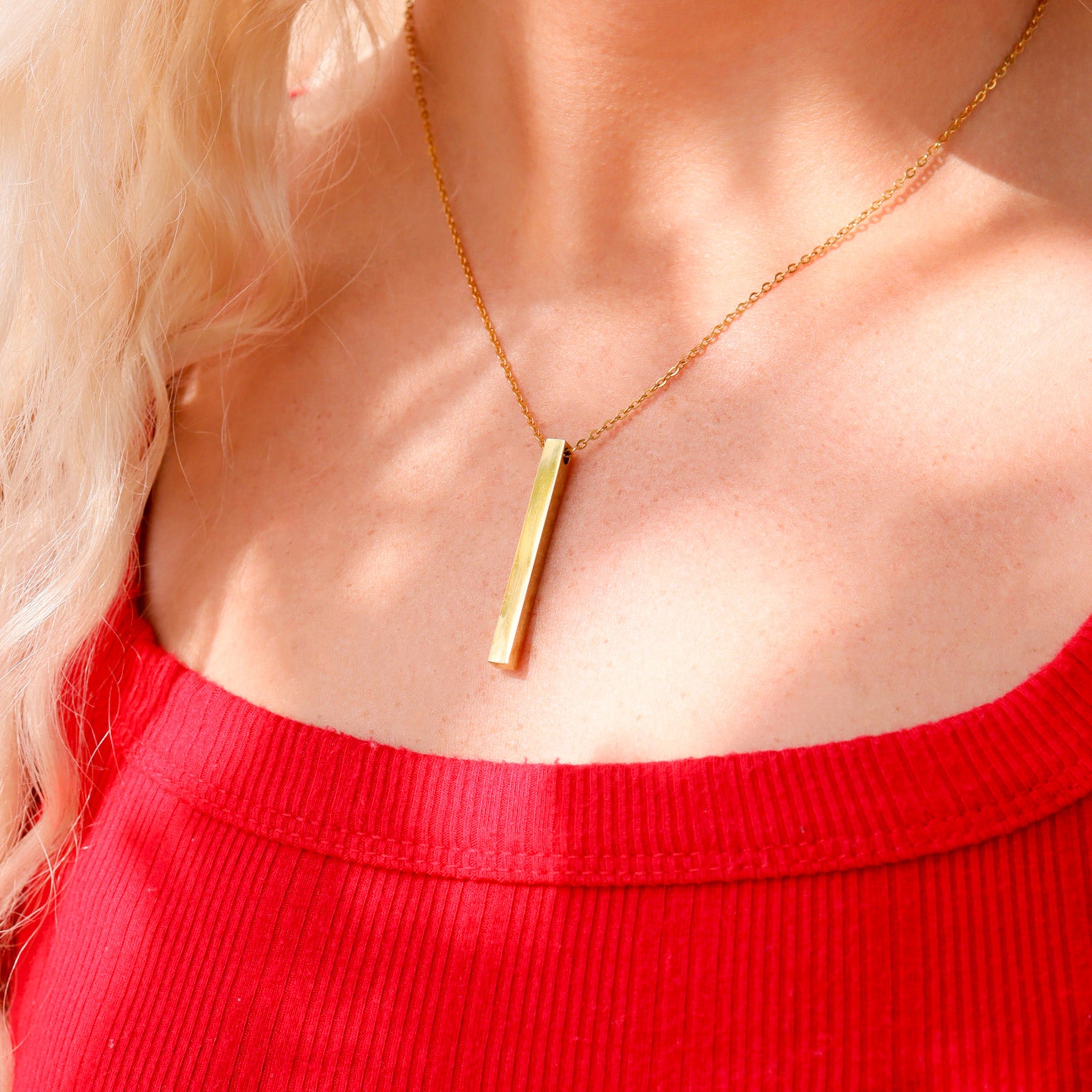 Chain necklace with vertical bar pendant lifestyle photo