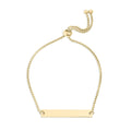 Gold bracelet with a bar clasp on a white background