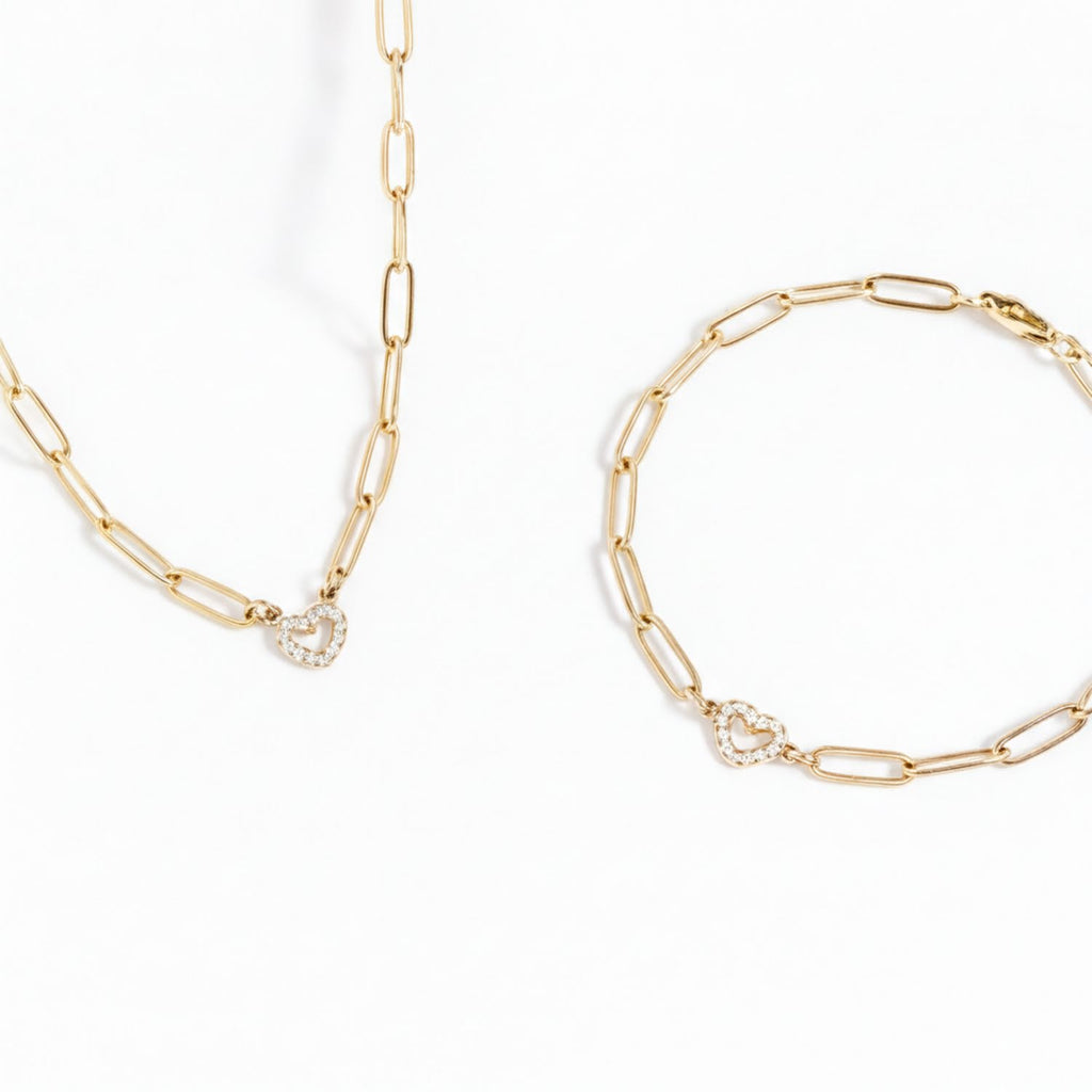 two pieces of gold jewelry: a necklace and a bracelet.