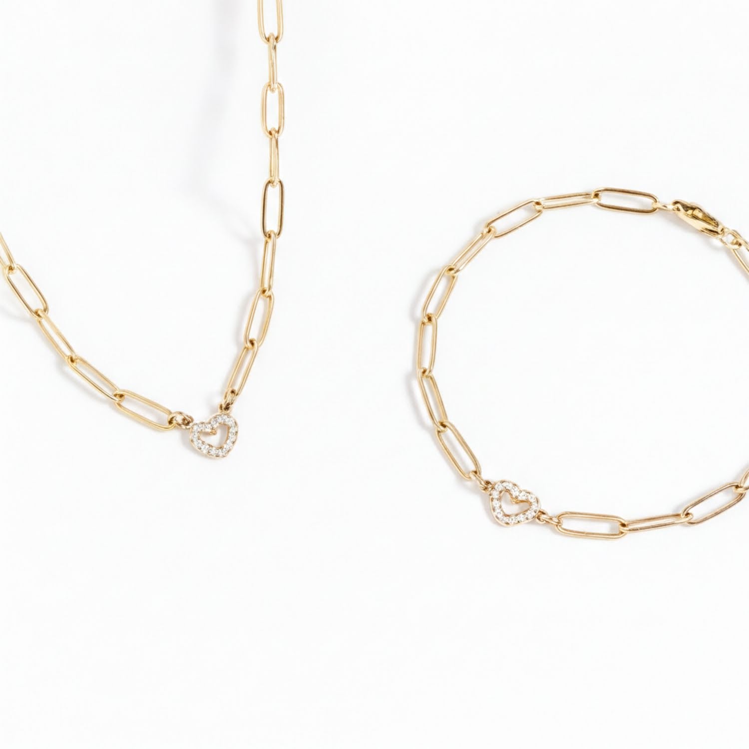 two pieces of gold jewelry: a necklace and a bracelet.