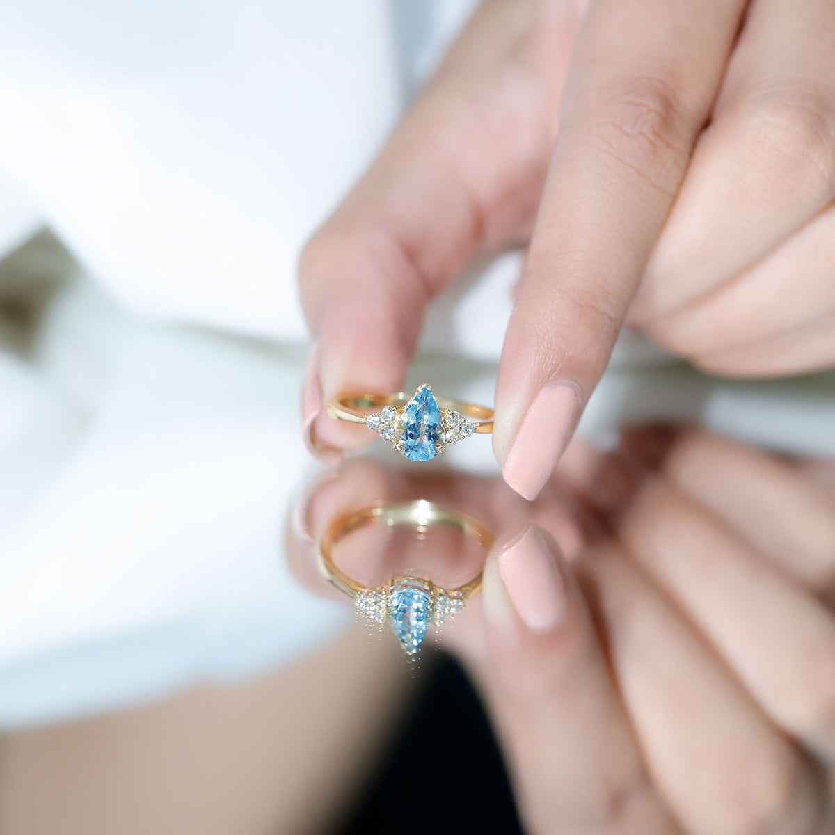 Aquamarine Engagement Ring – 1 Carat Pear Shaped Blue Gemstone With Diamond Trio