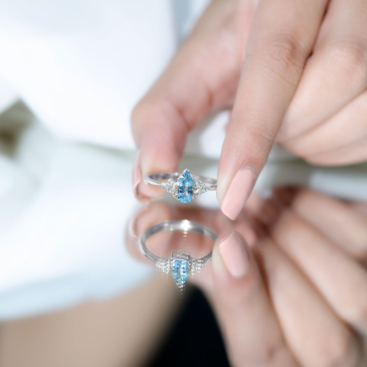 Aquamarine Engagement Ring – 1 Carat Pear Shaped Blue Gemstone With Diamond Trio