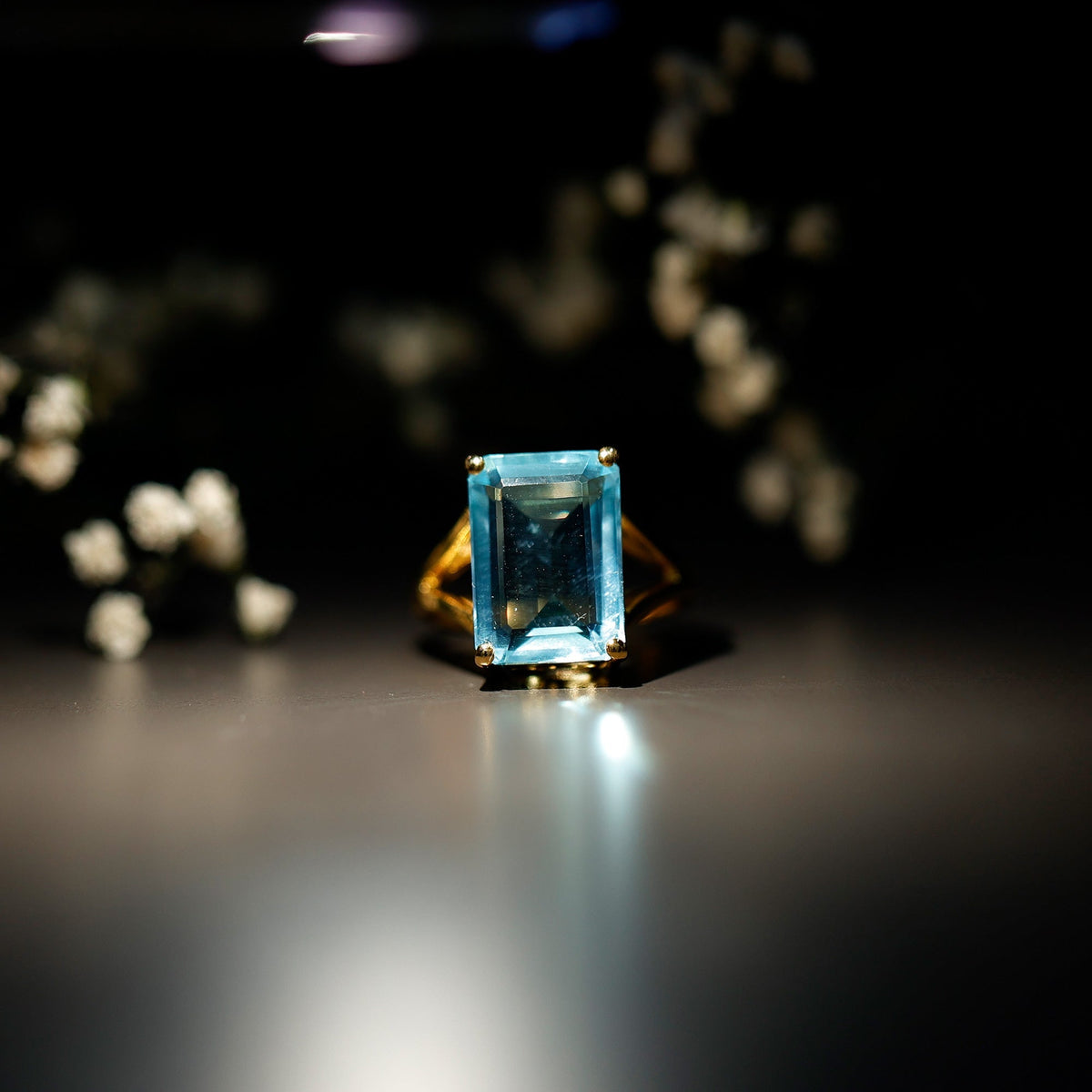 Aquamarine Engagement Ring – 9 Carat Emerald Cut Lab Grown Stone | Yellow Gold Basket Setting