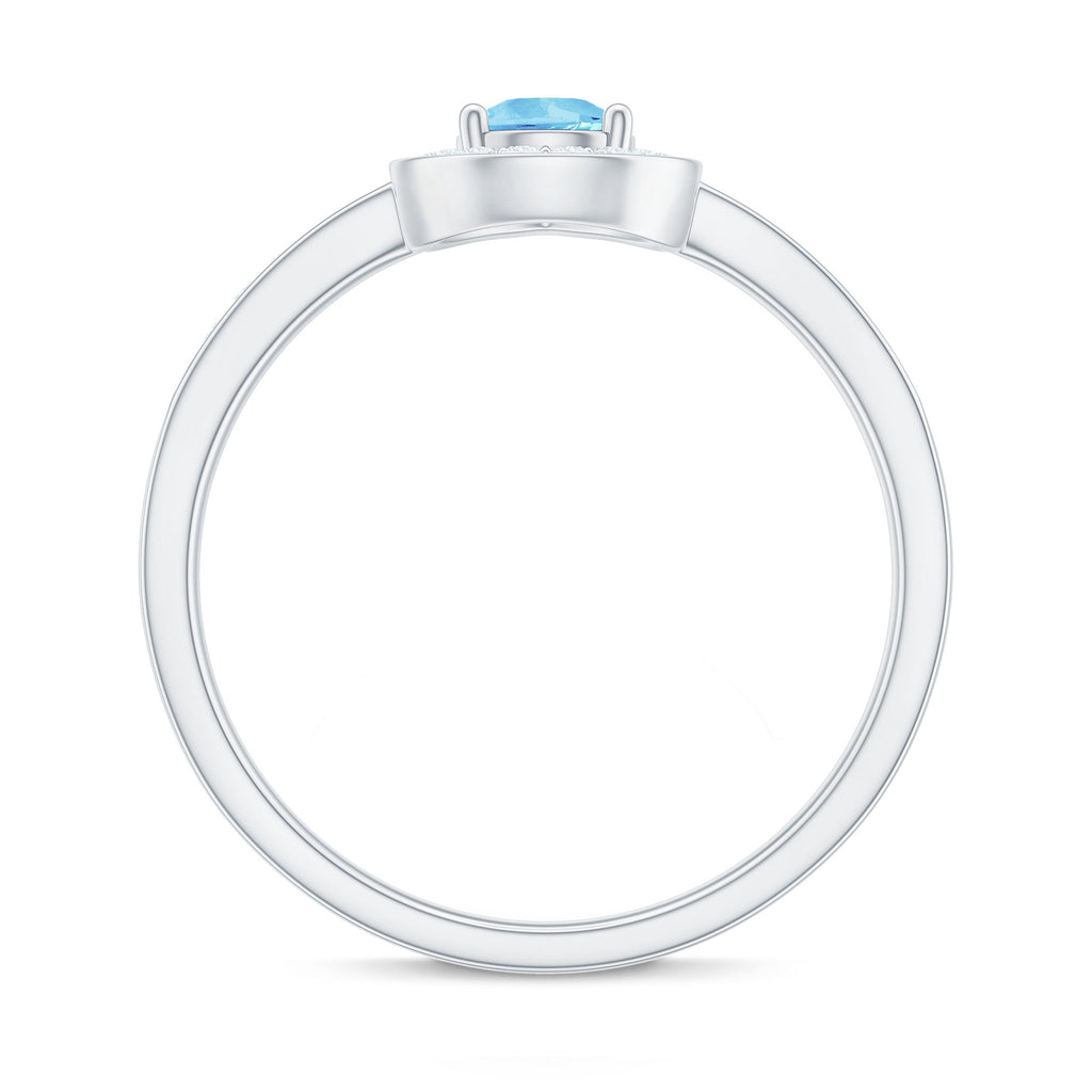 Aquamarine Engagement Ring – Pear Shape Blue Gemstone with Diamond Halo Setting