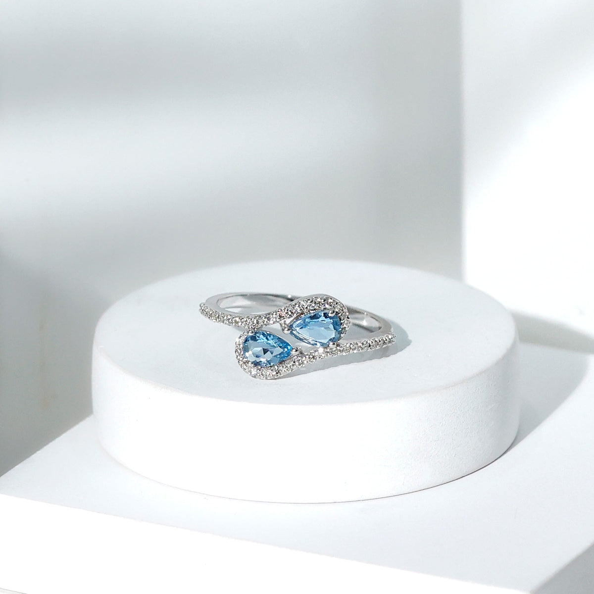 Aquamarine Engagement Ring – Two Stone Pear Shaped Bypass Shank With Diamonds