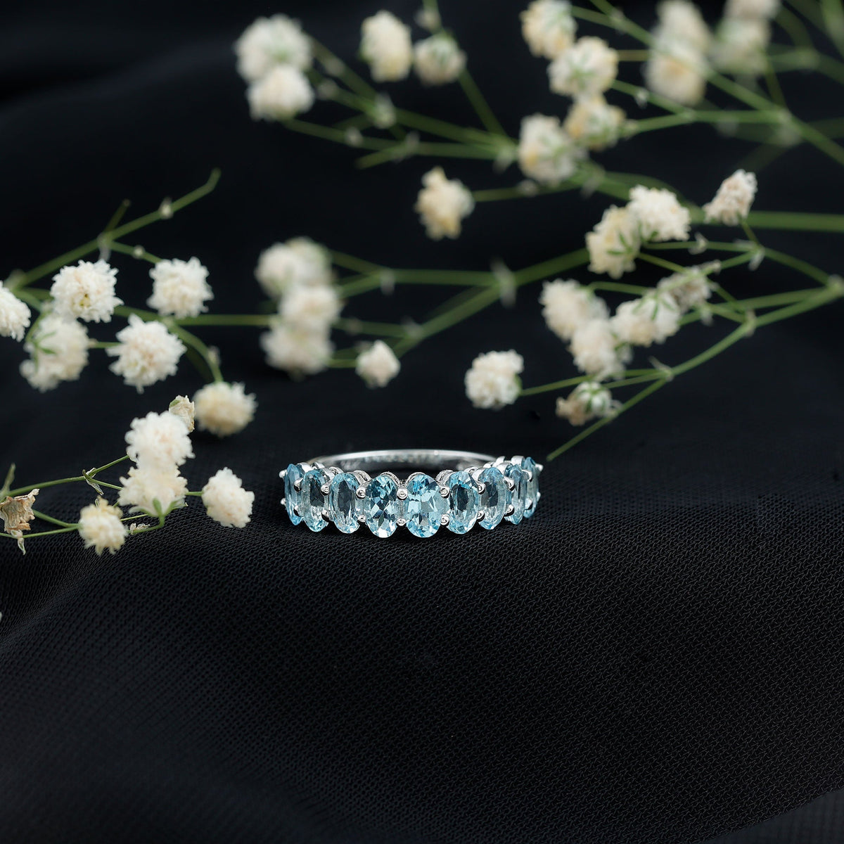 Aquamarine Eternity Ring – Oval Cut Half Eternity Band | Shared Prong Setting