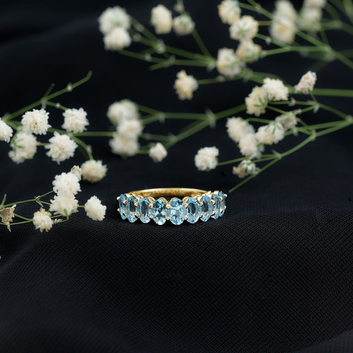 Aquamarine Eternity Ring – Oval Cut Half Eternity Band | Shared Prong Setting