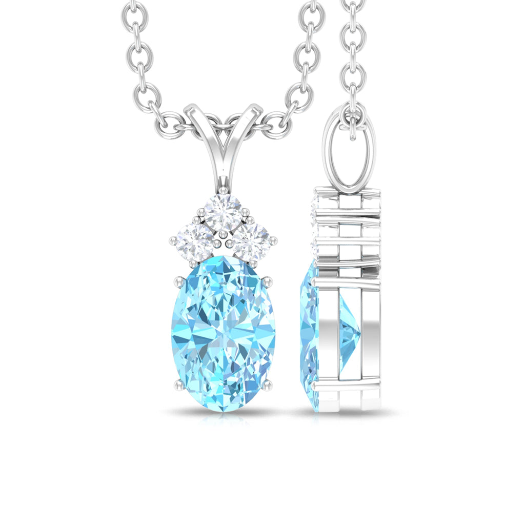 Aquamarine Pendant Necklace – Oval Cut Blue Gemstone with Diamond Trio Design