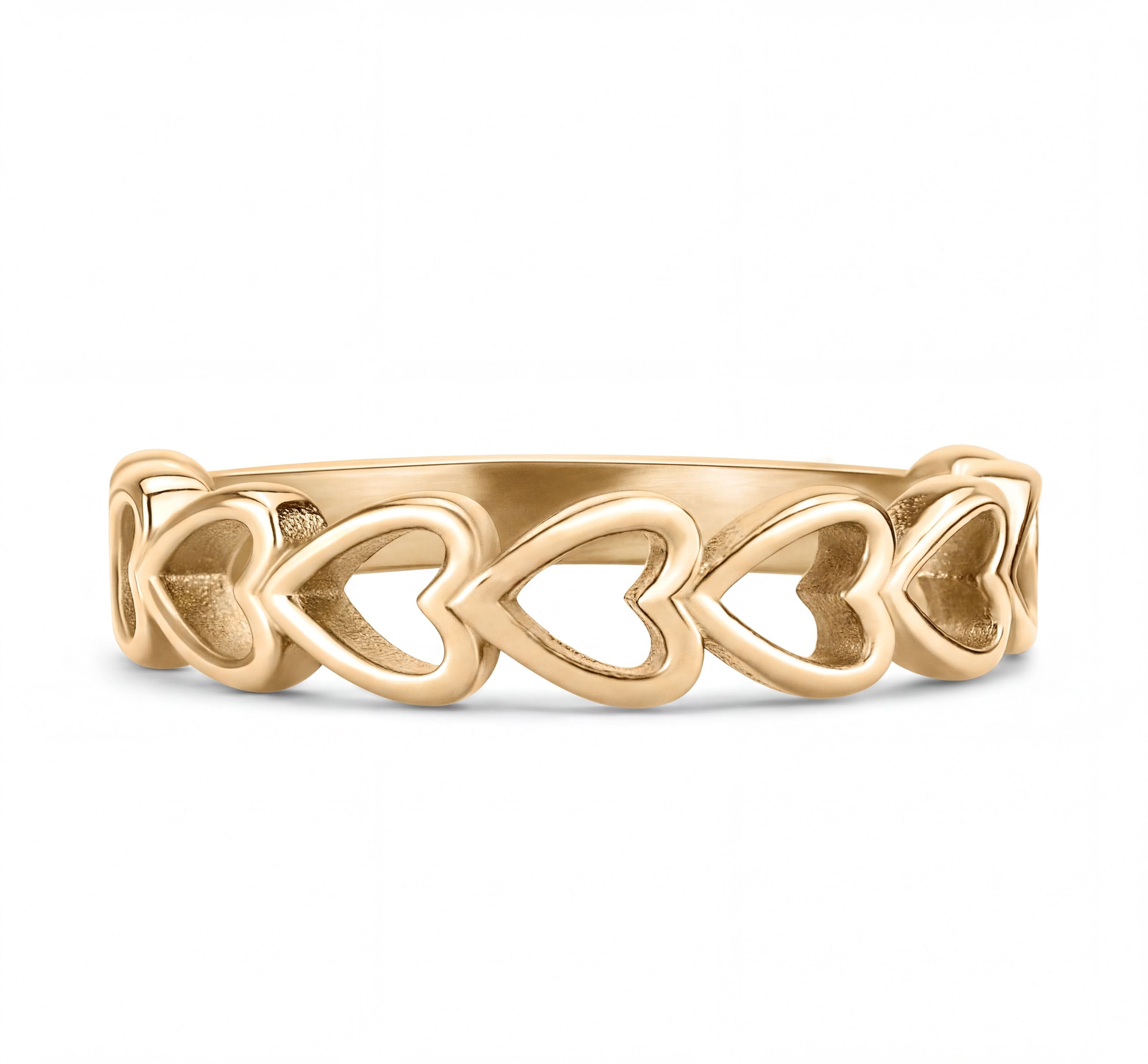 A gold ring with a heart-shaped design.