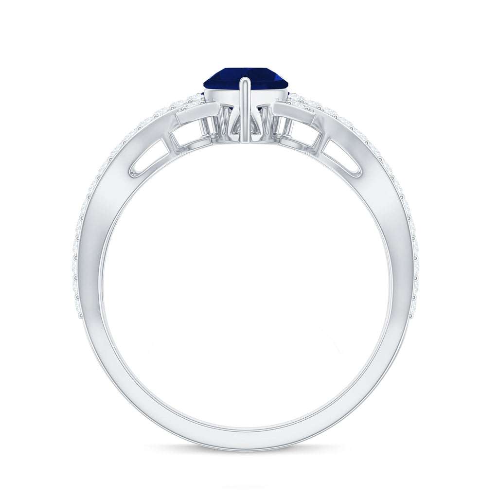 Blue Sapphire Engagement Ring, Pear Shape Diamond Crossover Ring