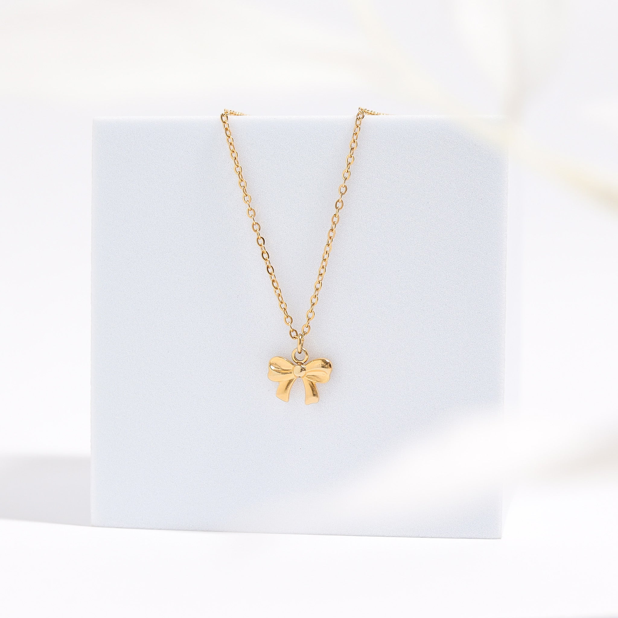 Gold Bow Charm | 18K PVD Coated Stainless Steel Ribbon Bow Pendant – Hypoallergenic Jewelry