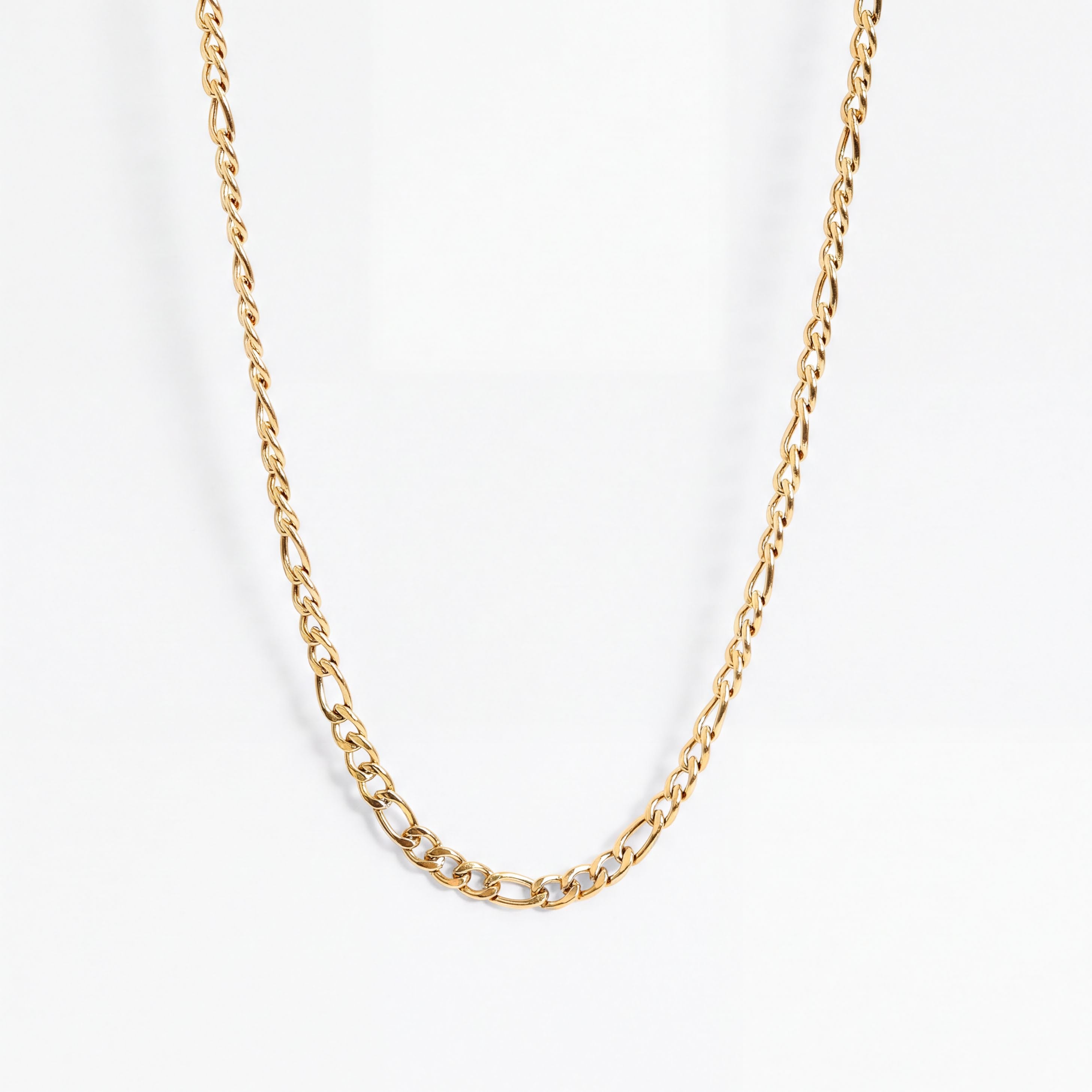 A gold chain necklace with a delicate design.