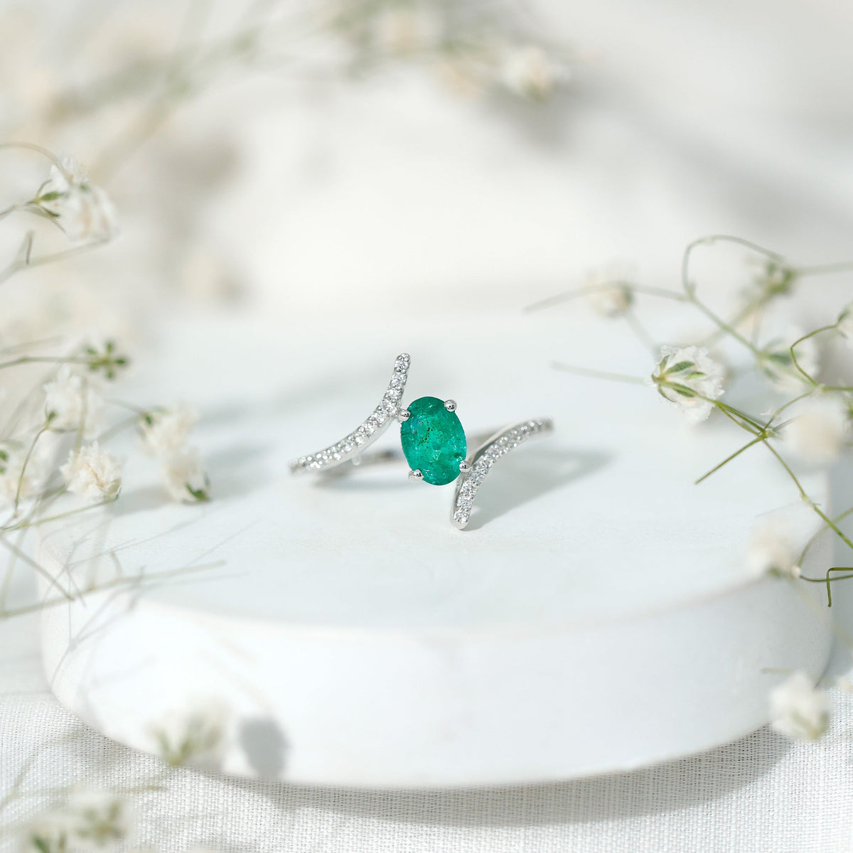 Emerald Bypass Ring - Oval Engagement Ring With Diamond Accents & Sculptural Band