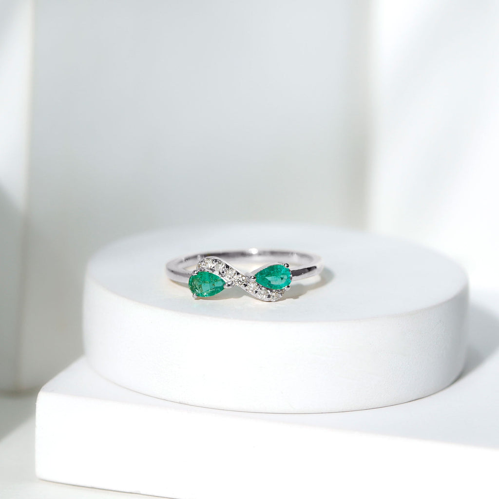 Emerald Diamond Promise Ring – Two Stone Infinity Pear Shaped Emerald Ring