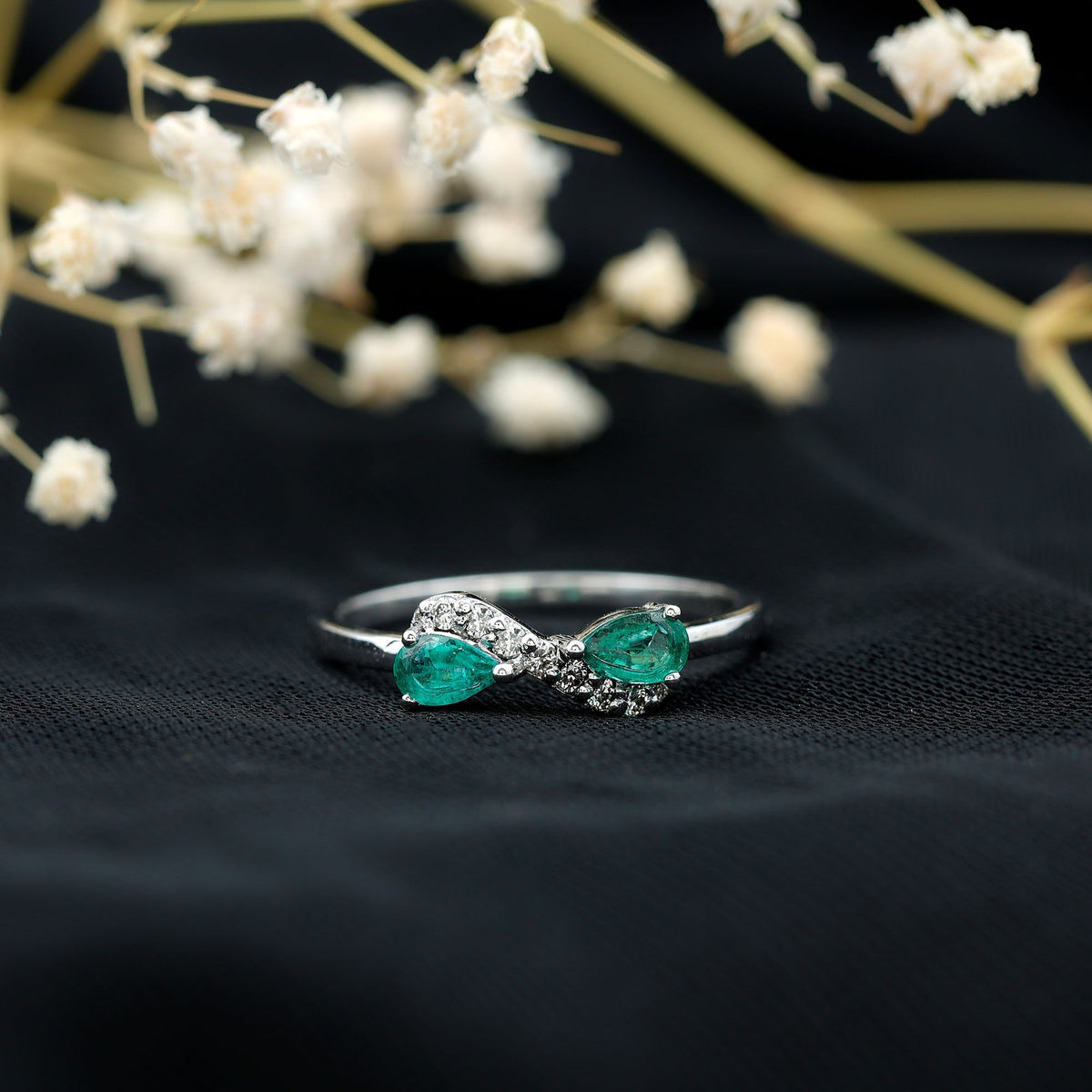 Emerald Diamond Promise Ring – Two Stone Infinity Pear Shaped Emerald Ring