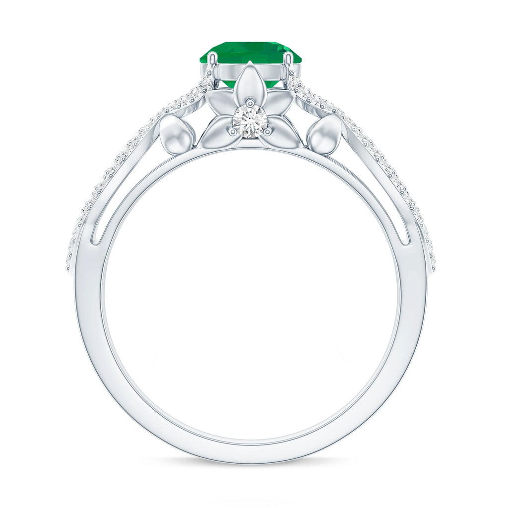 Emerald Engagement Ring – Designer Crossover Shank with Hidden Diamond Flower Accent