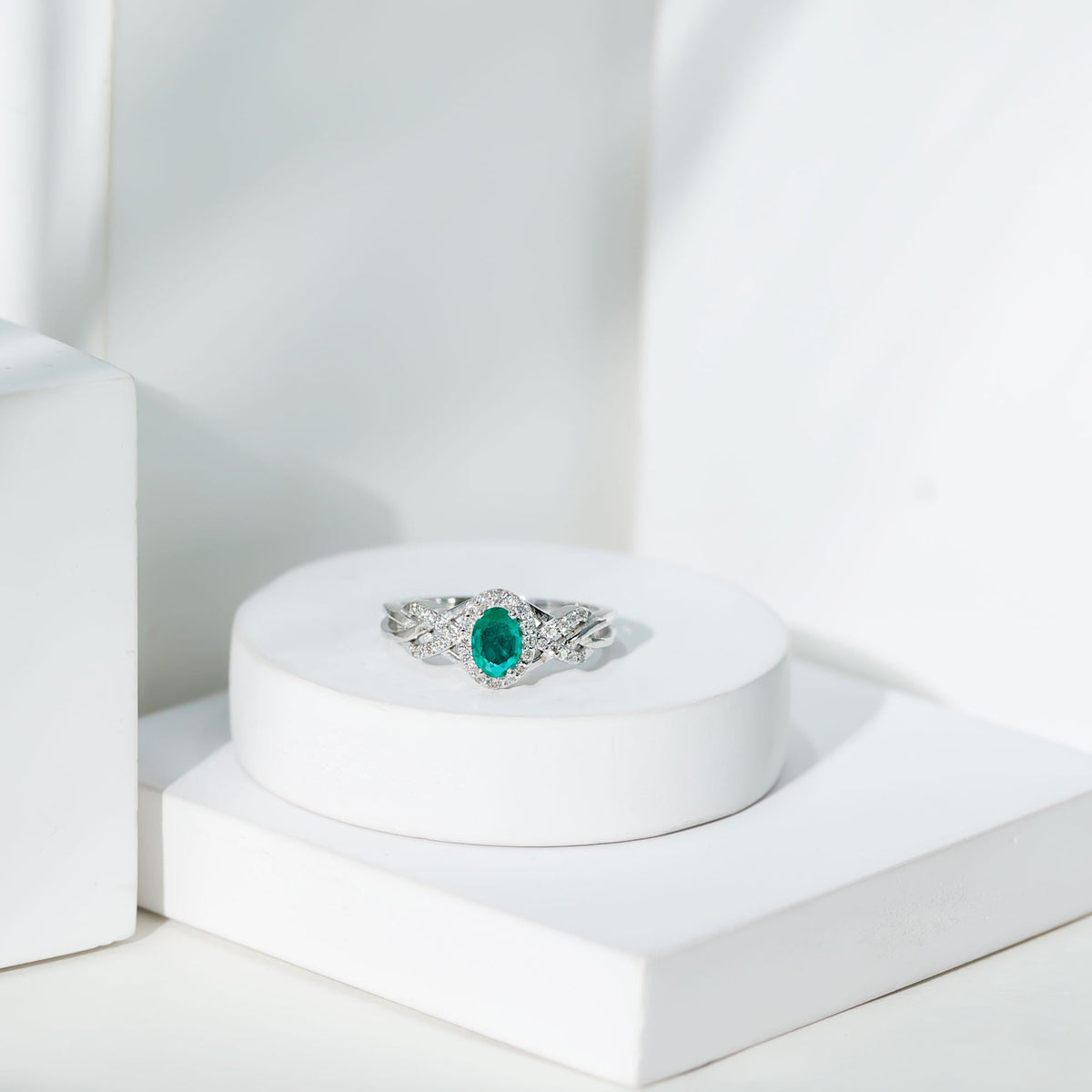 Emerald Engagement Ring – Oval Emerald Ring with Diamond Halo & Criss Cross Band