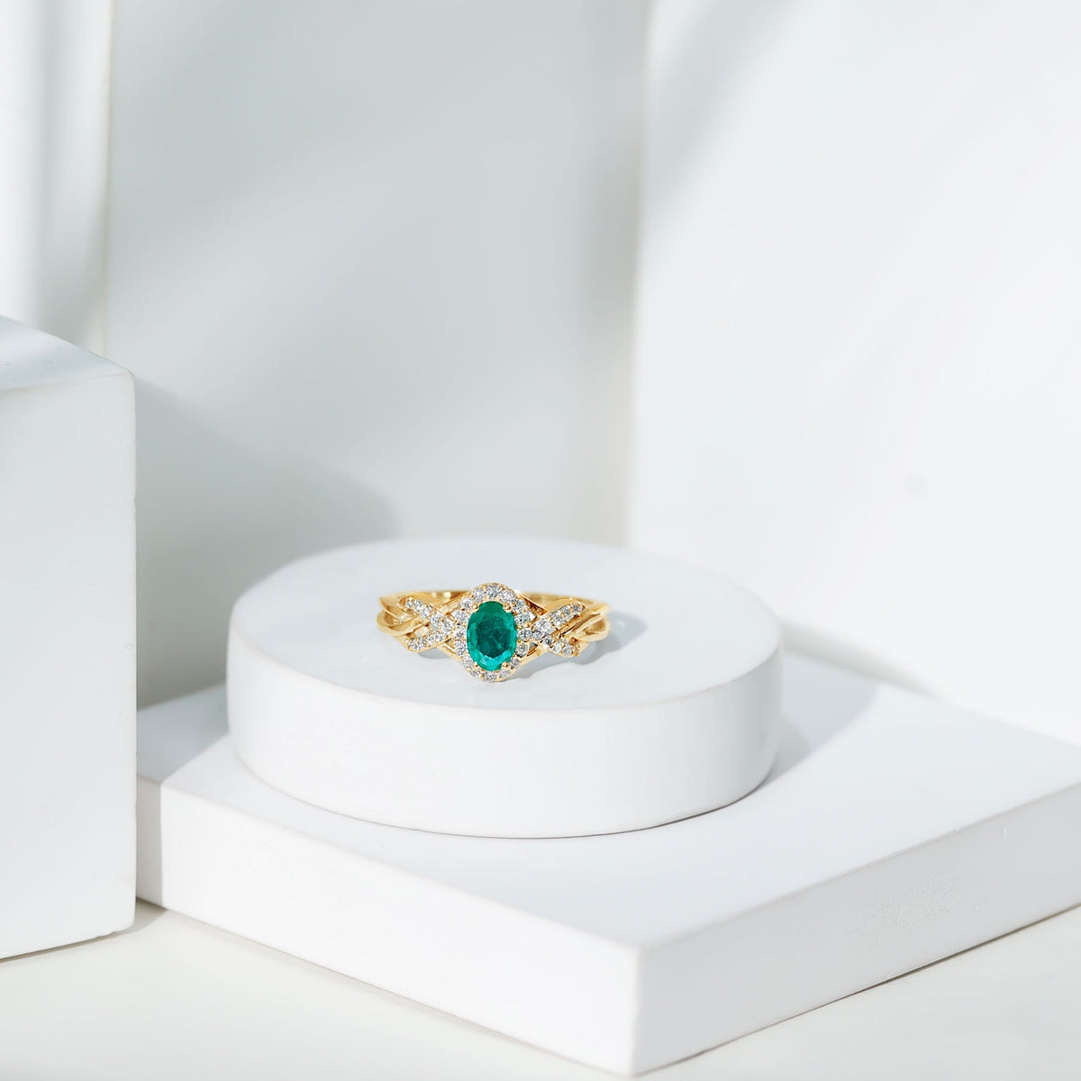 Emerald Engagement Ring – Oval Emerald Ring with Diamond Halo & Criss Cross Band