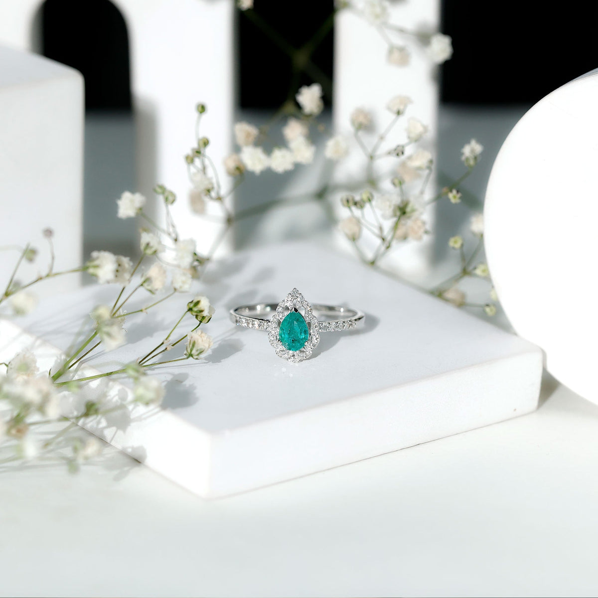 Emerald Engagement Ring – Pear Shaped Ring with Diamond Halo and Leaf Pattern